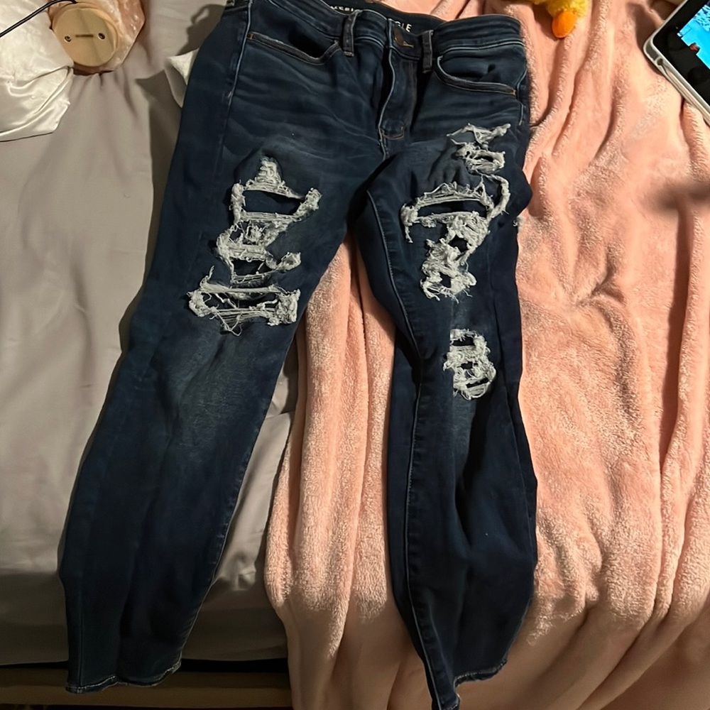 dark blue ripped jeans american eagle